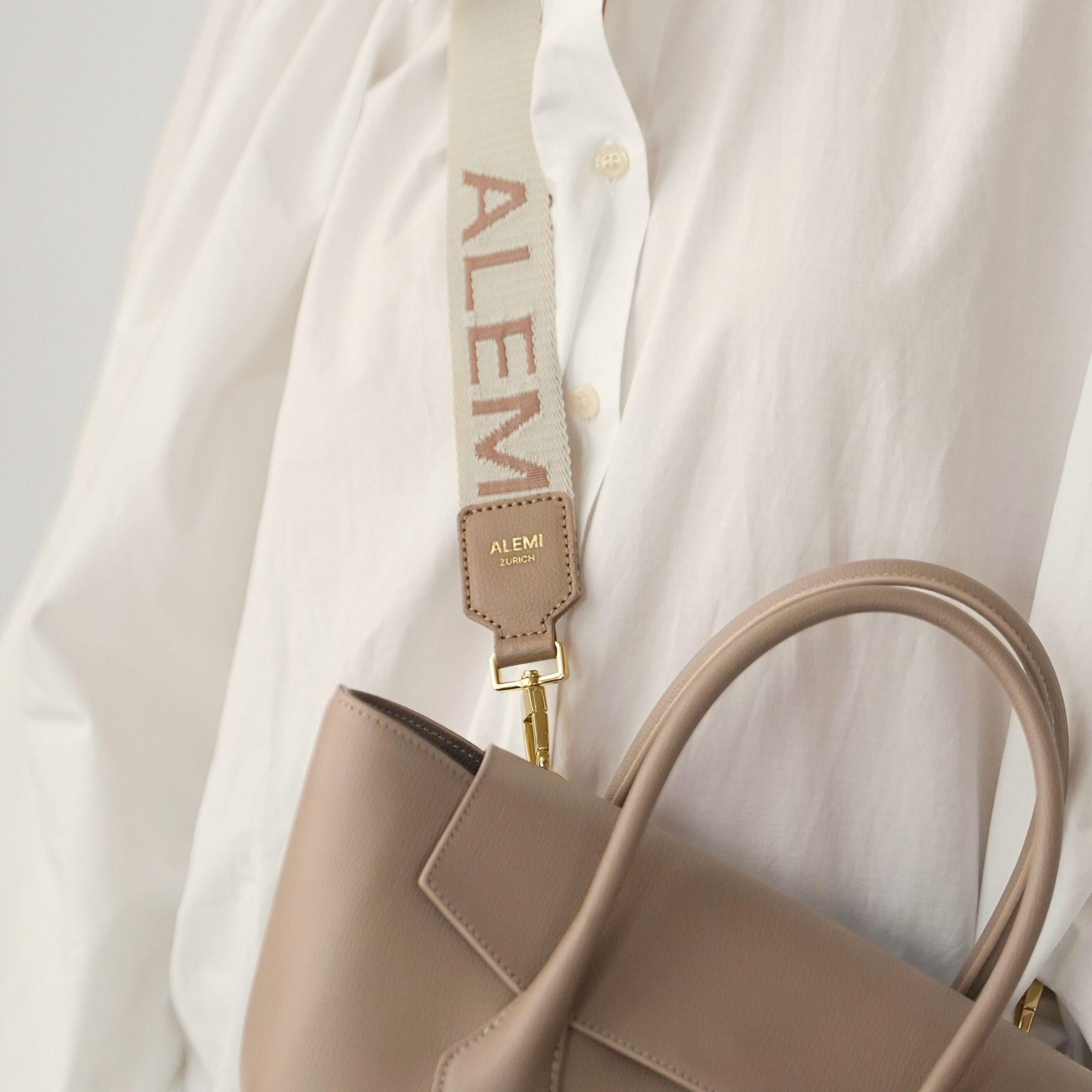 ALEMI Zurich | Adjustable Strap | Greige | Pebbled Leather | Model Crossbody on Ida Small Bag