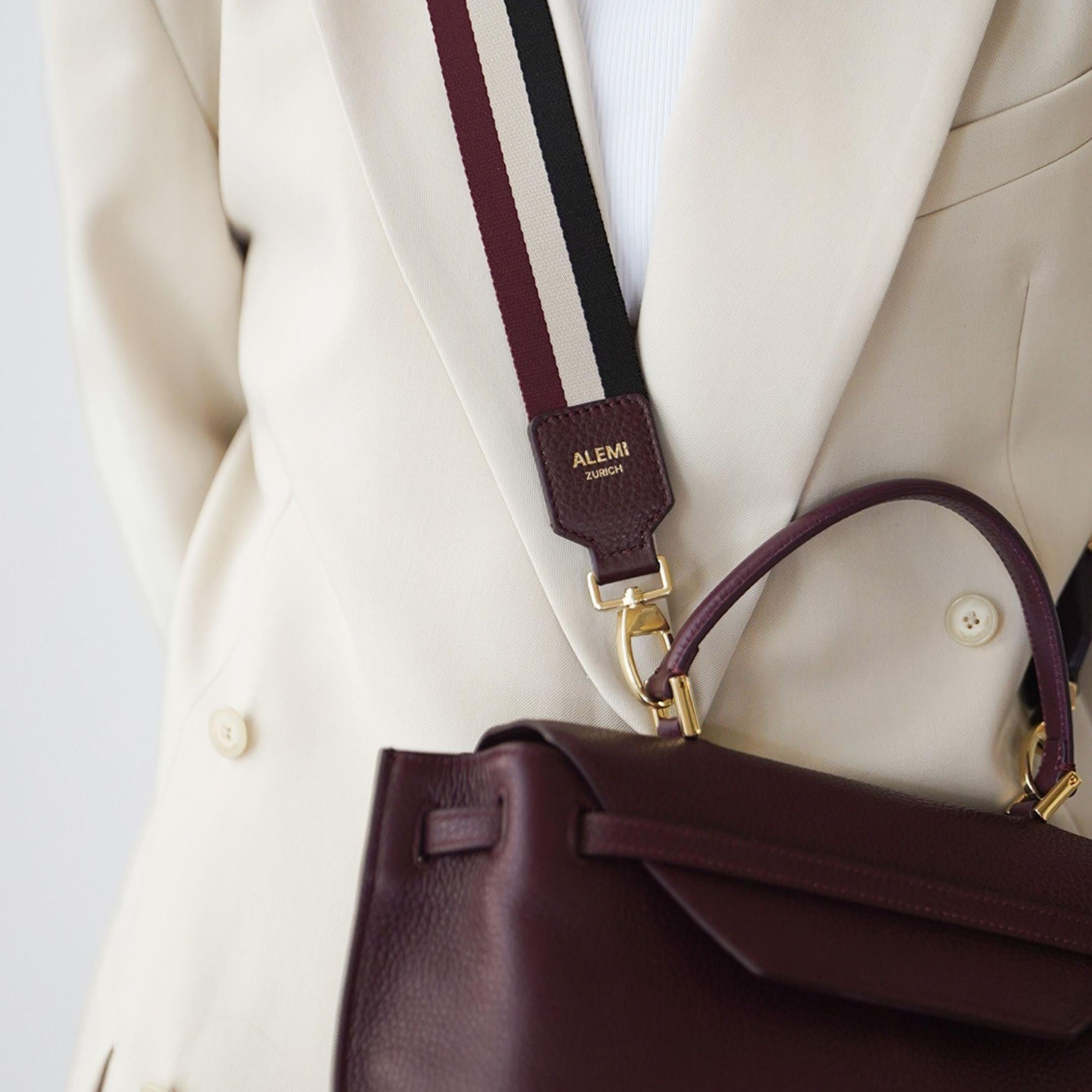 ALEMI Zurich | Adjustable Strap | Maroon with Black | Soft Grain Leather | Model Crossbody on Viadukt Small Bag