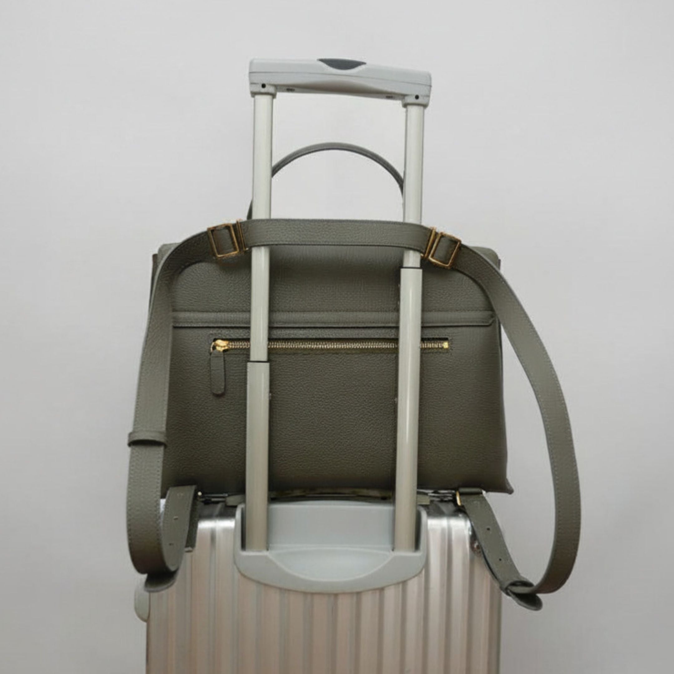 ALEMI Zurich | VIADUKT WORK | Laptop Bag | Olive Green | Soft Grain Leather | Bag on suitcase