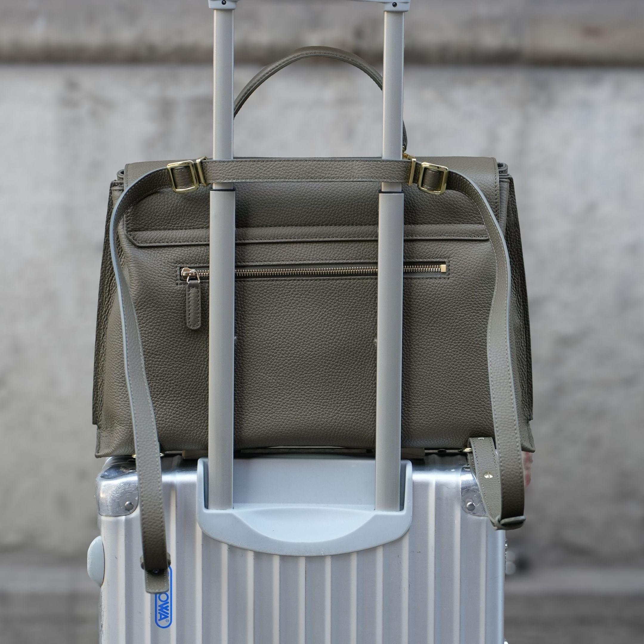 ALEMI Zurich | VIADUKT WORK | Laptop Bag | Olive Green | Soft Grain Leather | Bag on suitcase