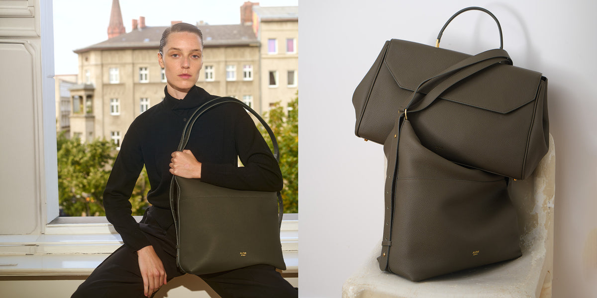ALEMI Zurich | Homepage Banner | LETTEN | Olive Green I Soft Grain Leather | Woman at a window carrying the bag on her shoulder, next to the bag on a chair
