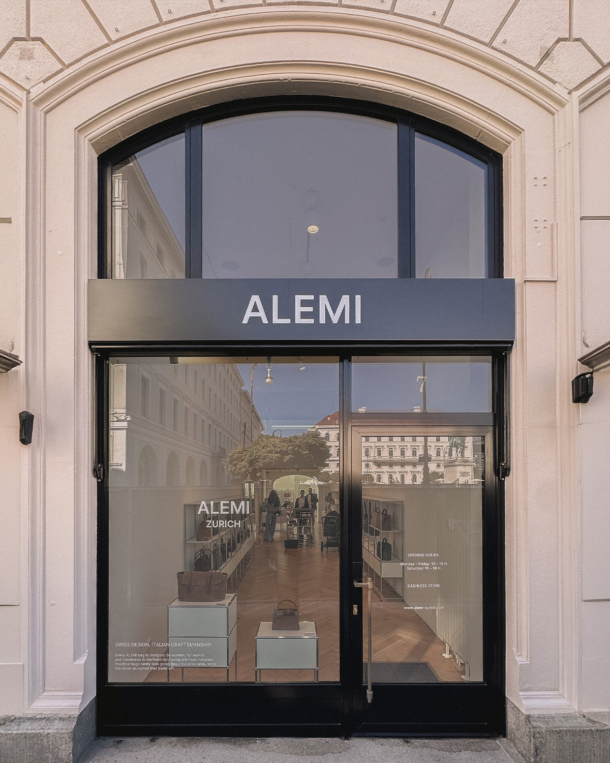 ALEMI Zurich | Munich Store | Store front with ALEMI sign and shop window