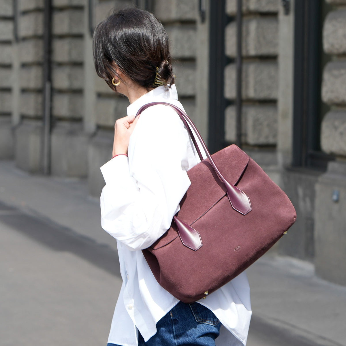 ALEMI IDA in Maroon Red Suede Leather carried on the shoulder in Zurich