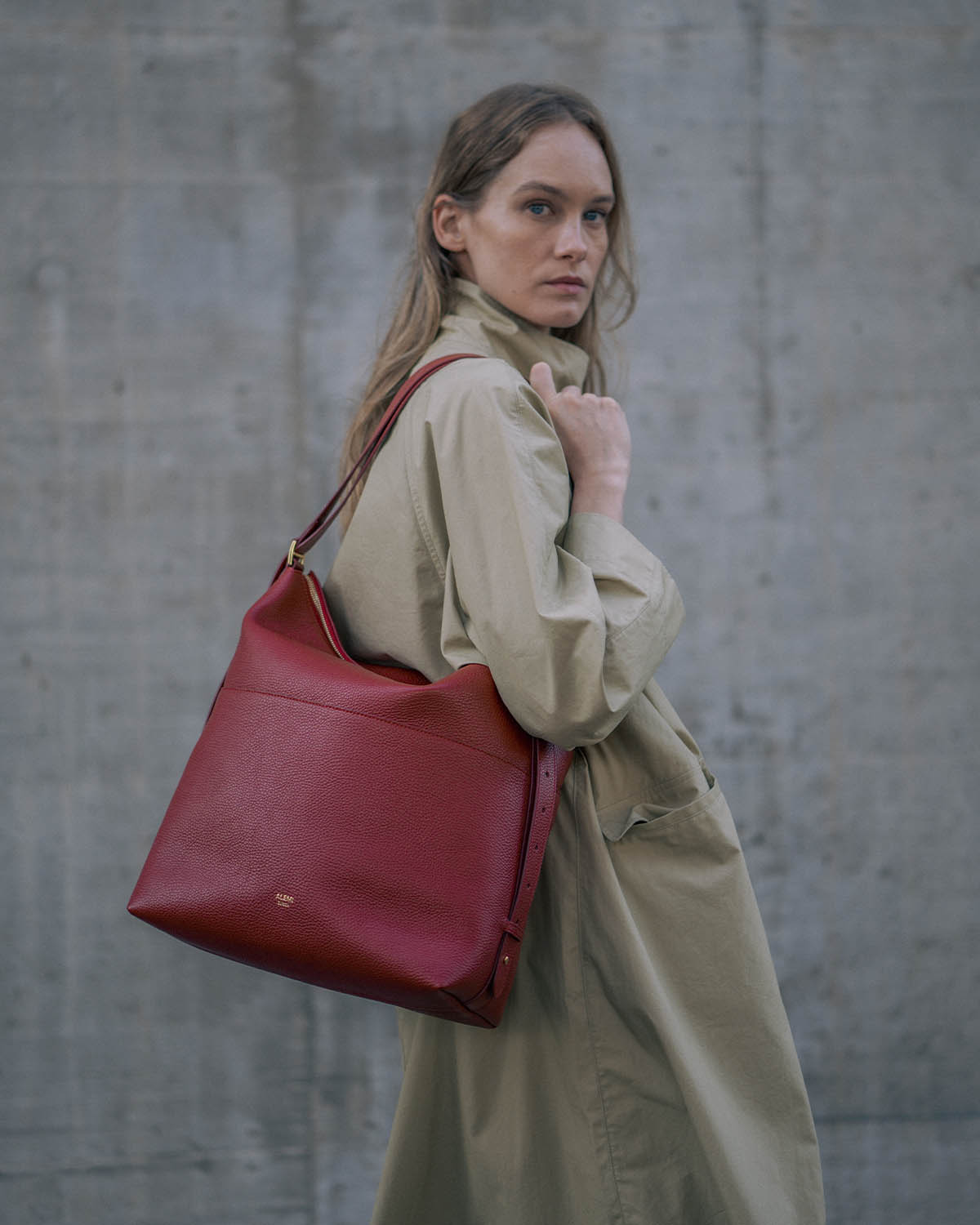 LETTEN in Swiss Red – worn on the shoulder