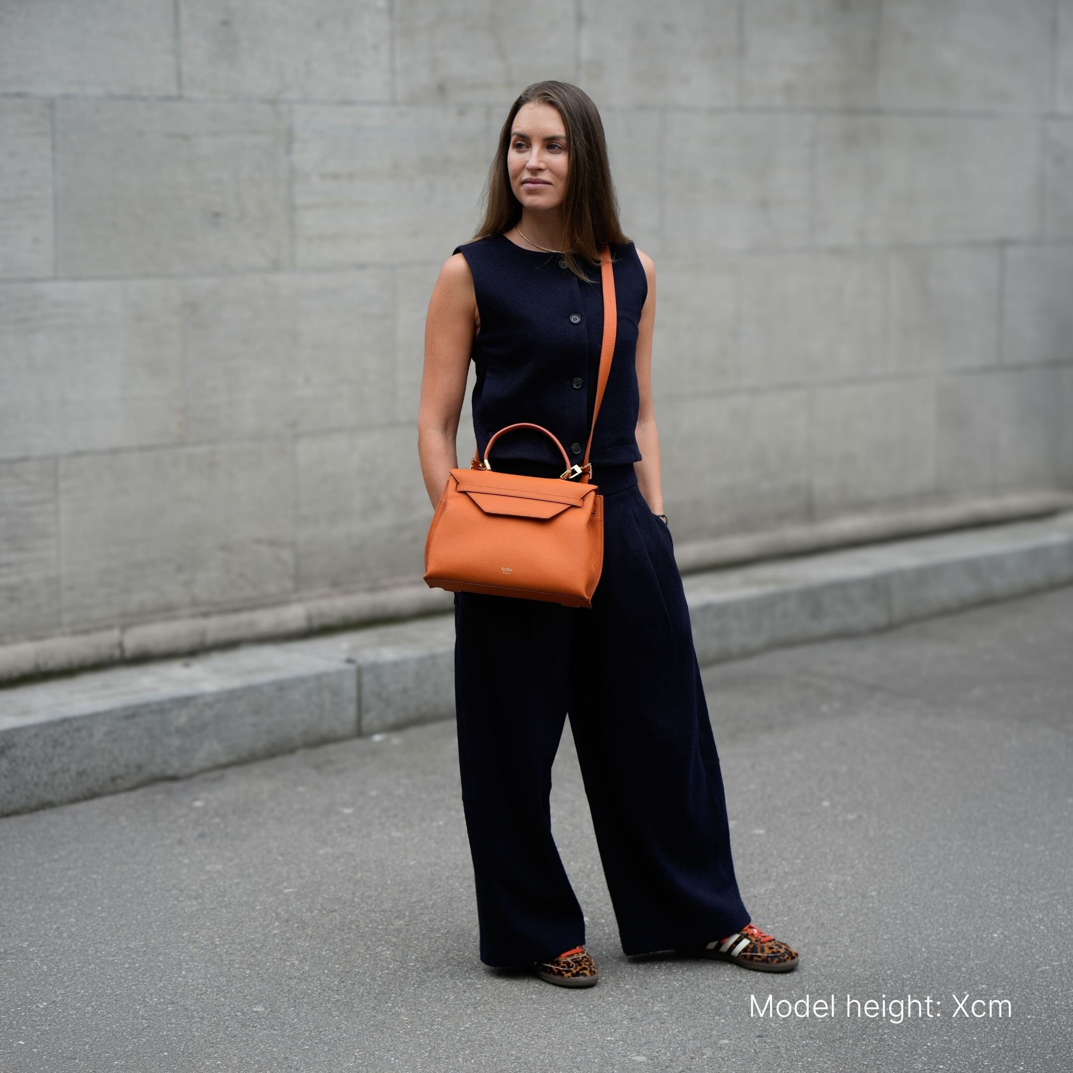 ALEMI Zurich | VIADUKT | Small Bag | Burnt Orange | Soft Grain Leather | Bag on model