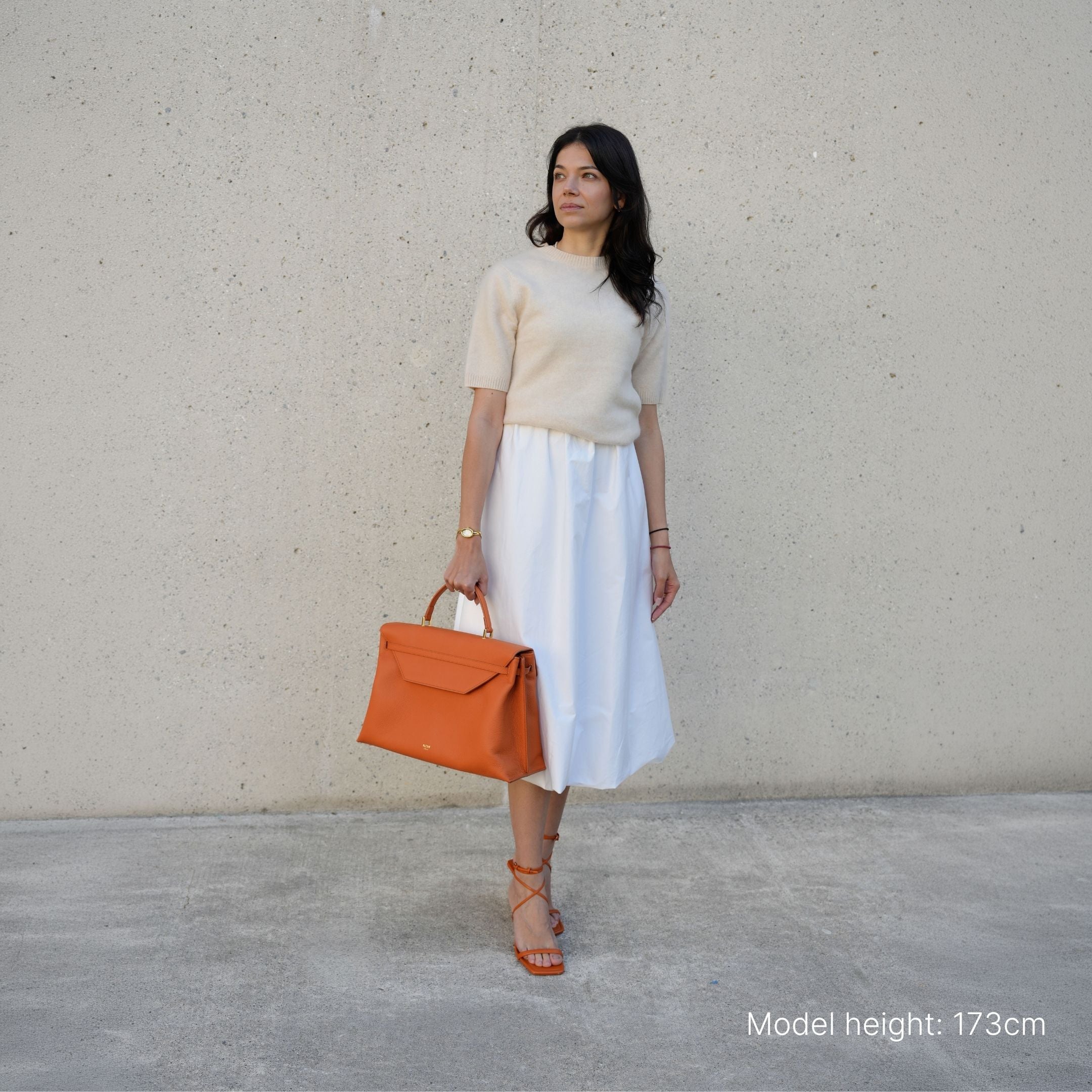 ALEMI Zurich | VIADUKT WORK | Laptop Bag | Burnt Orange | Soft Grain Leather | Bag on model