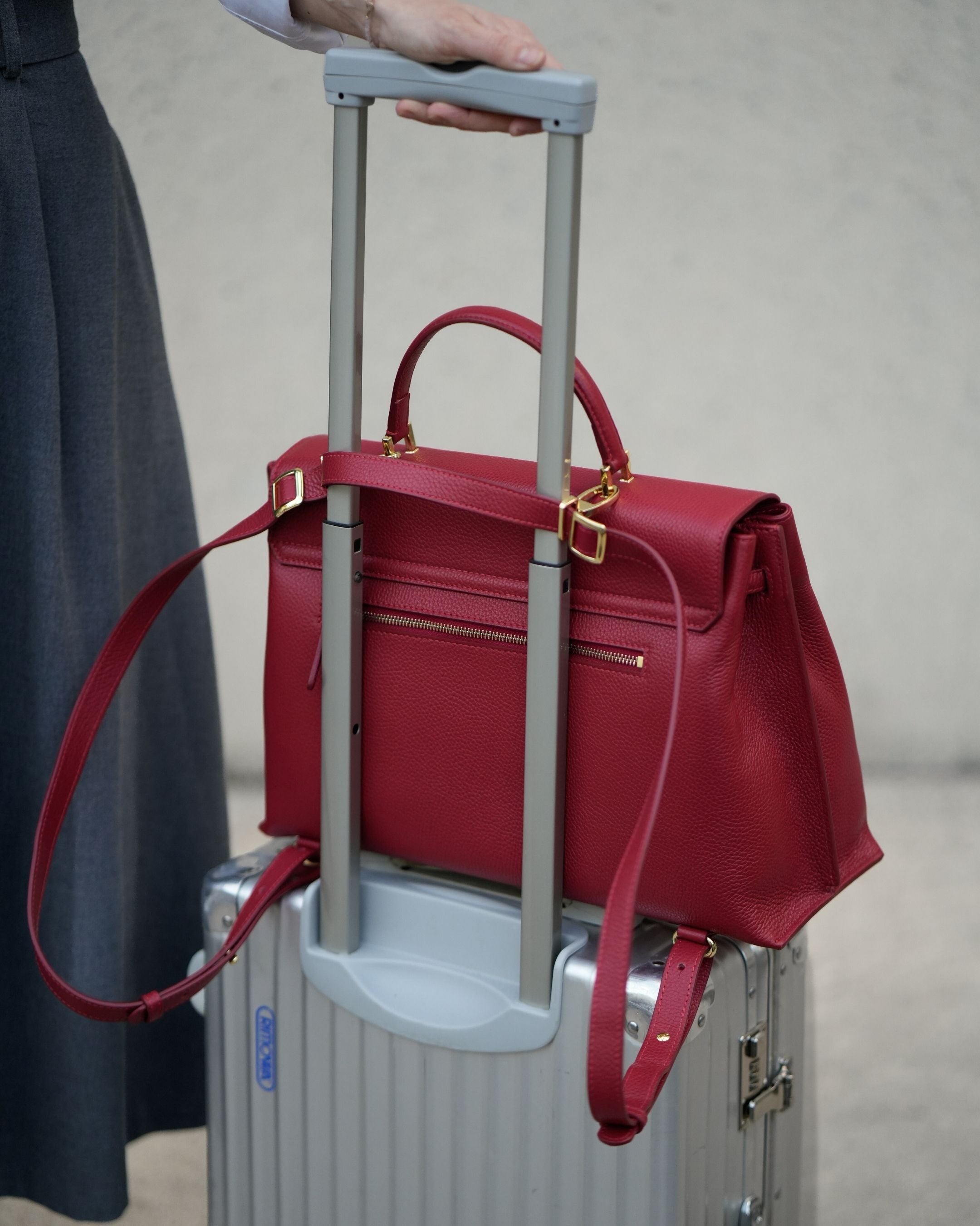 ALEMI Zurich | VIADUKT WORK | Laptop Bag | Red | Soft Grain Leather | Bag on luggage